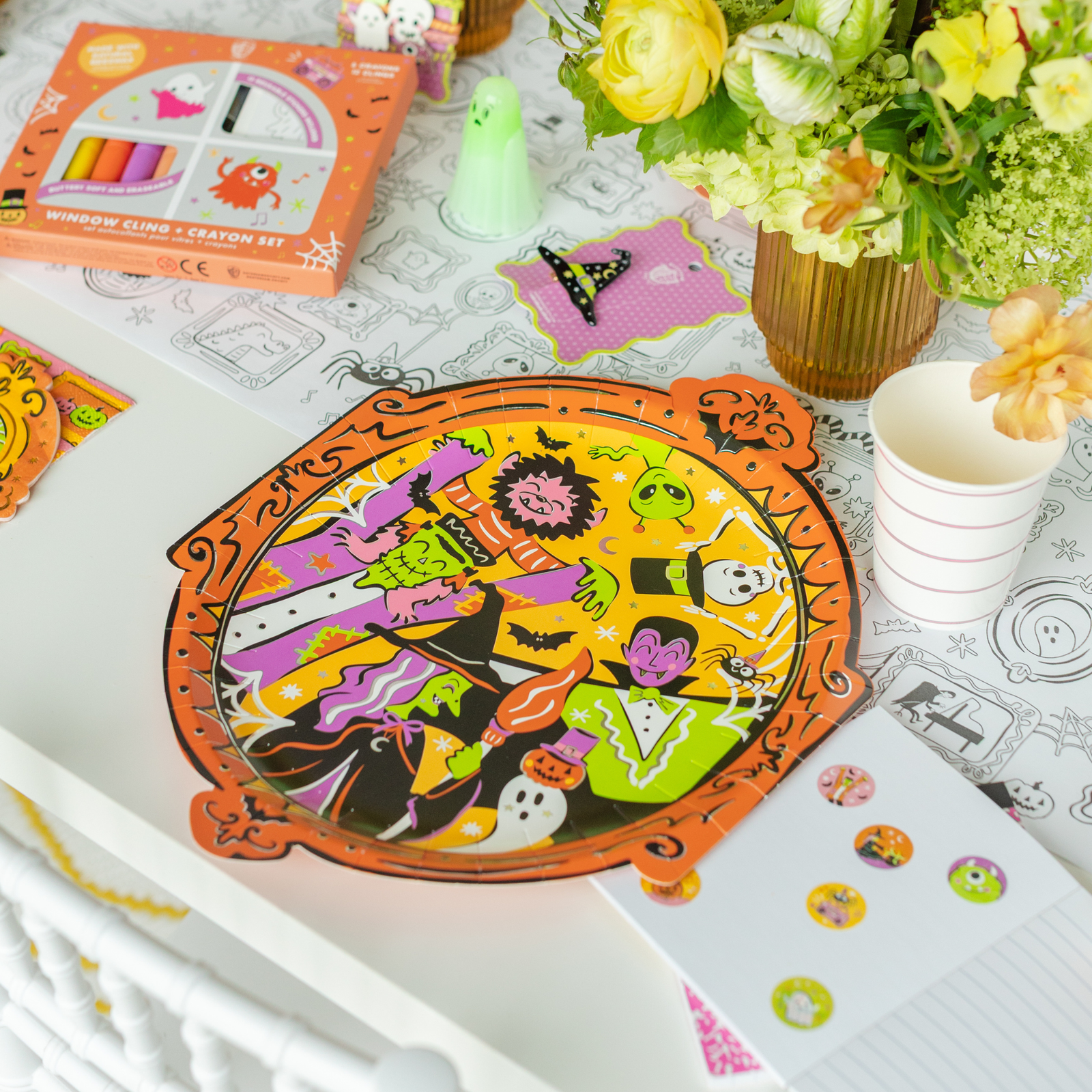 Monster Mash frame serving platter with a window-cling crayon set, ghost decor, and florals.
