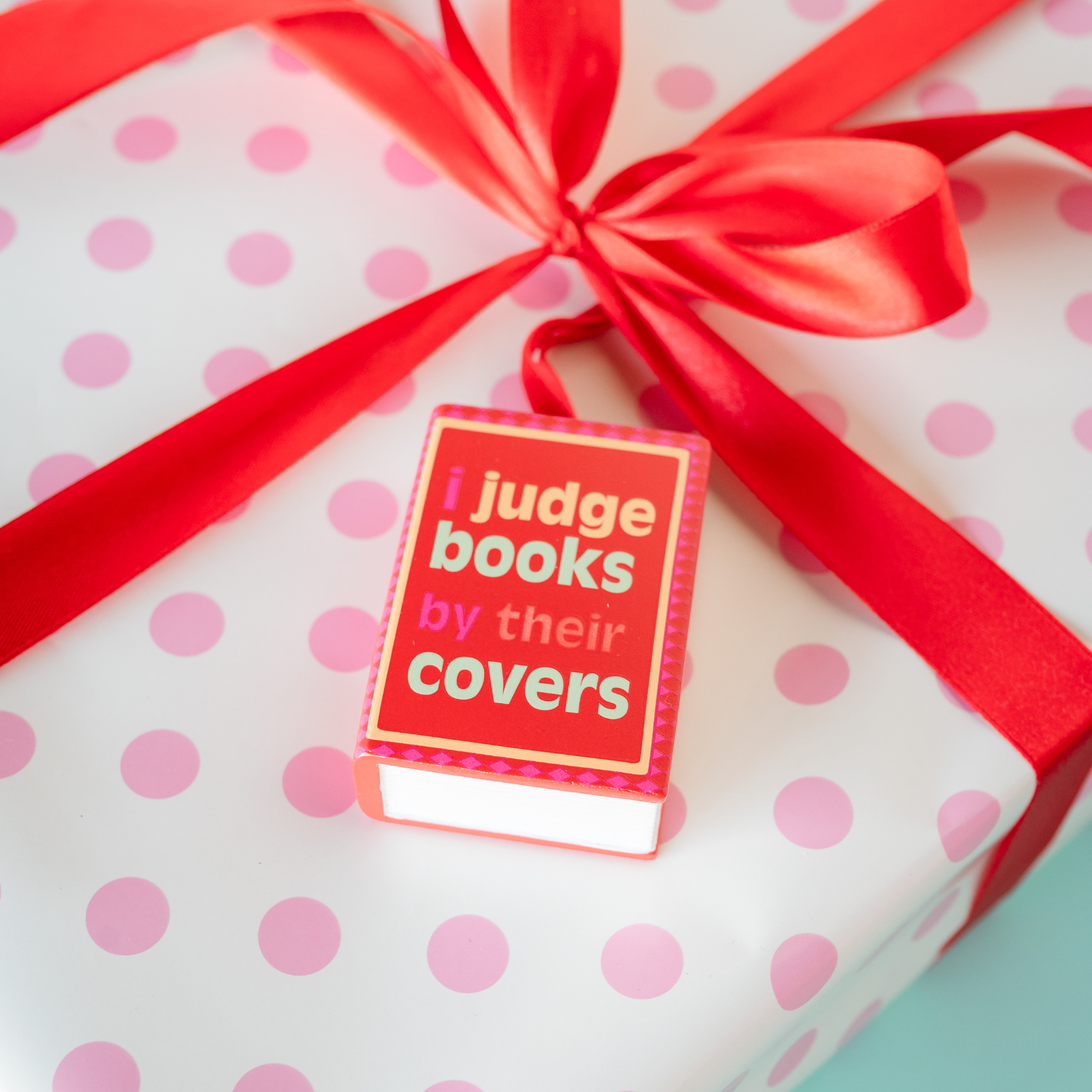 I Judge Books By Their Covers Book Ornament, close-up detail.