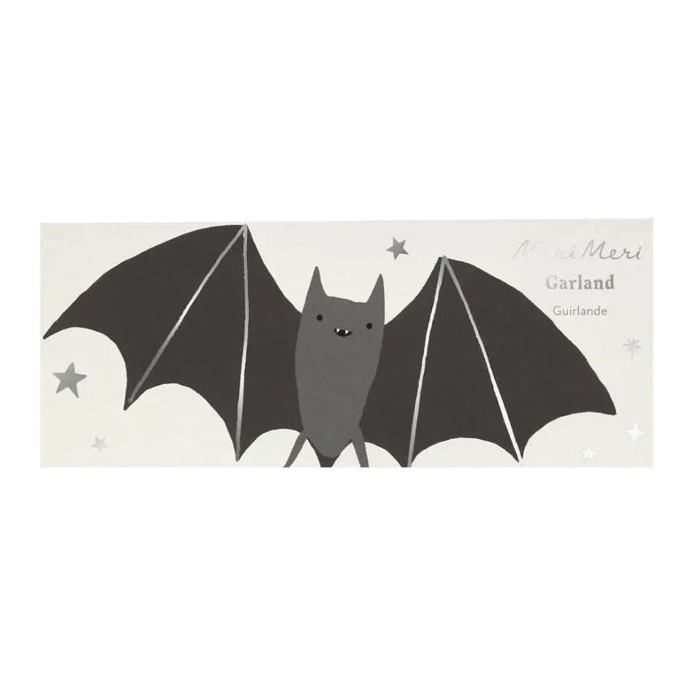 Meri Meri bat garland on its packaging, illustrated black bat and stars.