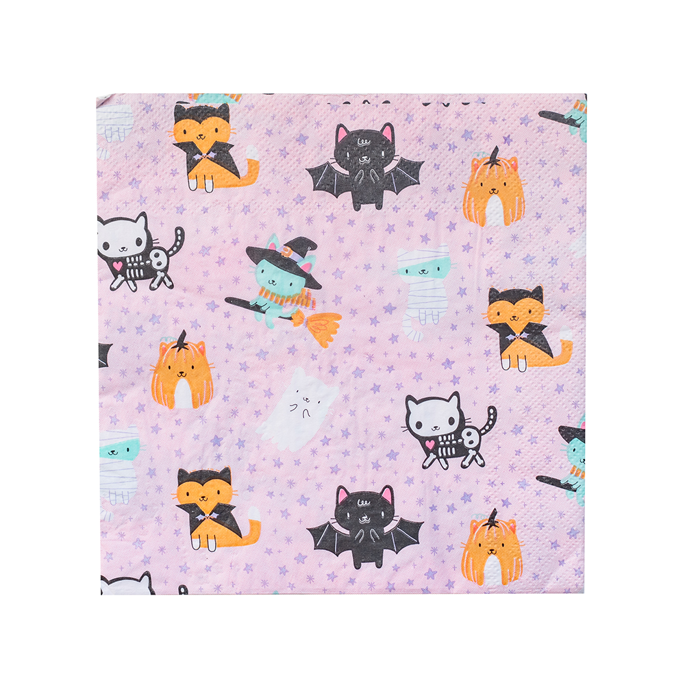 Lavender napkin printed with cartoon Halloween cats — skeleton, witch, and mummy — bats, and pumpkins.